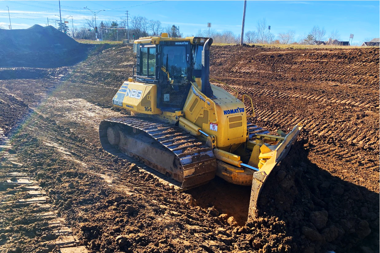 dozer in pond